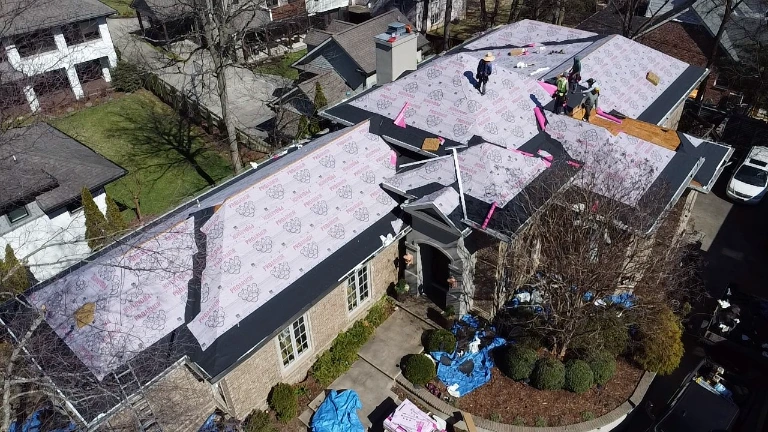 White Glove Roofing team performing a residential roofing installation in Calera, AL