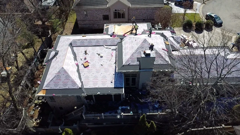 White Glove Roofing team performing a residential roofing installation in Gallatin, AL
